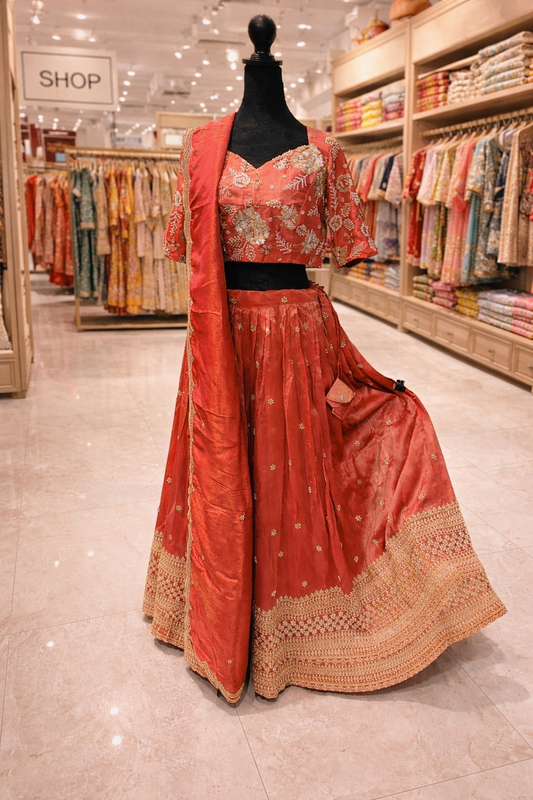 Elegant Orange Silk Blend Lehenga Choli with Intricate Embroidery