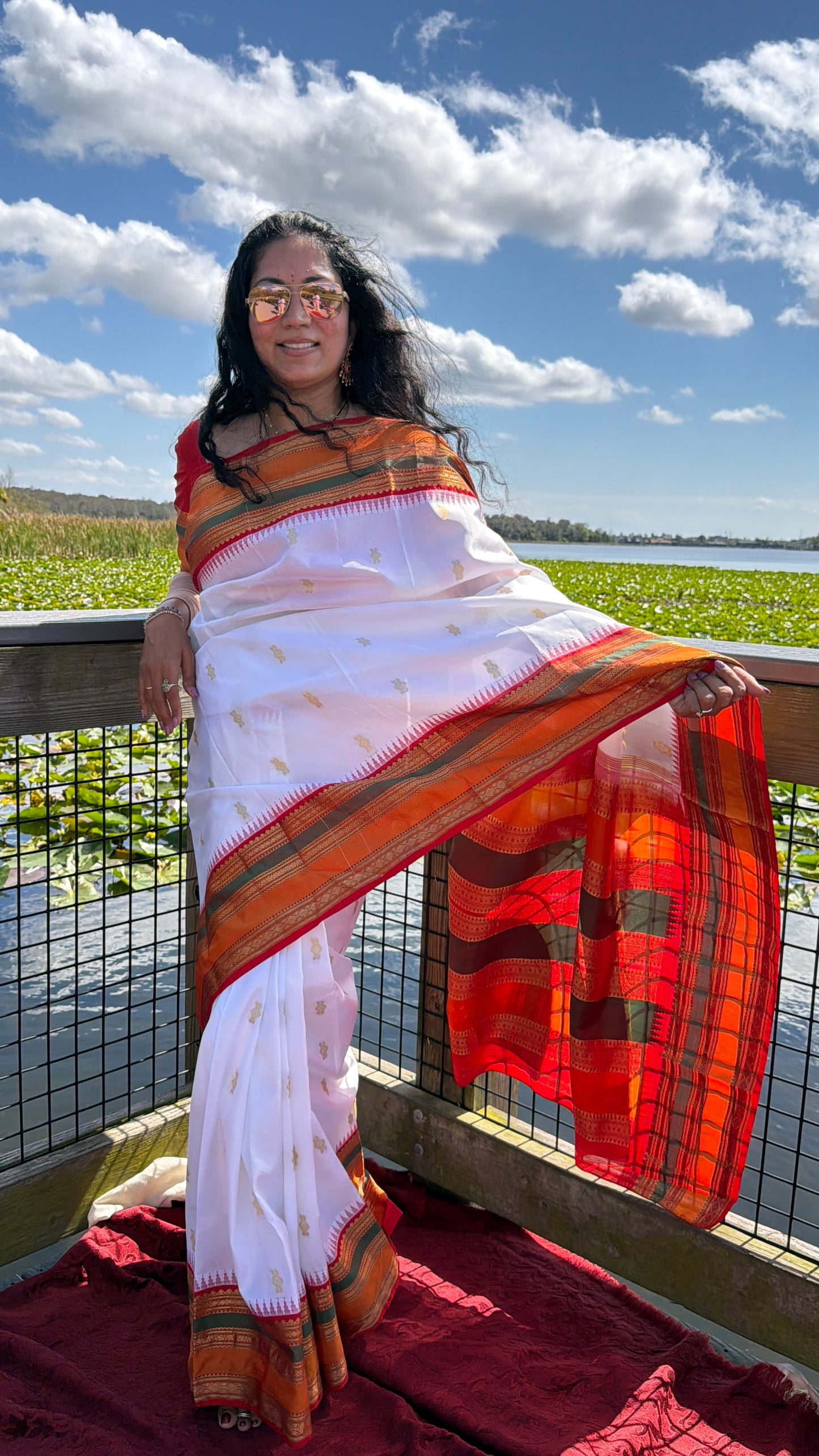 Authentics of Gadwal
White with red combination 
Fabric : Pure Silk , pure zari 
Handloom
Sari with blouse stitched to size 38 - 42 inches bust