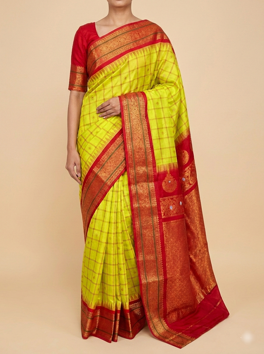 Authentics of Gadwal
Greenish yellow to red  combination 
Stone studded earring inspiration weaving 
Fabric : Pure Silk , pure zari 
Handloom
Sari with blouse stitched to size 38 - 42 inches bust