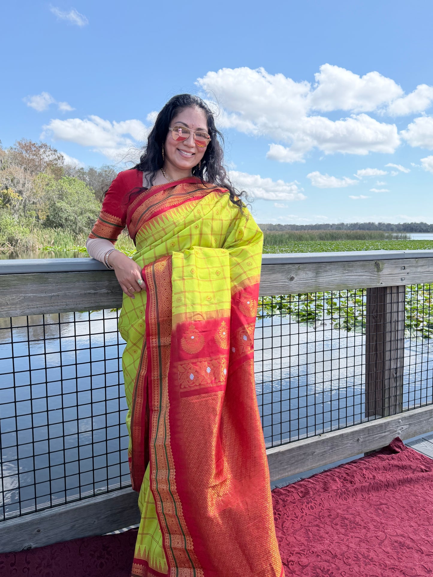 Authentics of Gadwal
Greenish yellow to red  combination 
Stone studded earring inspiration weaving 
Fabric : Pure Silk , pure zari 
Handloom
Sari with blouse stitched to size 38 - 42 inches bust